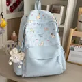 Kawaii light blue backpack with cute pony pattern and white fluffy keychain charm - Blue with Charm
