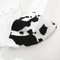 Detail view of a soft cow-print plush bucket hat with fluffy texture for winter warmth - 55-58cm / Black
