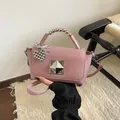 Chic dusty pink mini square crossbody bag with beaded handle and silver heart charm detail - With Charm / Pink