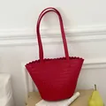 Elegant red hand-woven tote bag with scalloped top edge for summer fashion. - Red