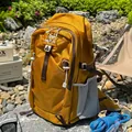 Lightweight mustard yellow waterproof hiking backpack designed for outdoor trekking adventures. - Mustard Yellow