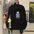 Minimalist black student backpack with cartoon cat embroidery and cute moon charm - With Charm / Black