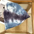 Detail view showing the soft blue and grey tie-dye knit texture and rolled edge of this beanie - 55-60cm / Tie-Dye Blue