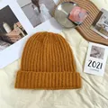 Detailed macro shot of thick knit mustard yellow beanie with chunky ribbed texture - 55-62cm (Elastic) / New Oversized Knit Hat (AC8924) / Camel