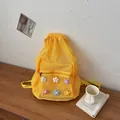 Lightweight yellow mesh drawstring backpack with colorful flower decorations for summer - Yellow