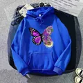 Detailed view of a cozy oversized blue hoodie featuring a butterfly floral graphic print - Klein Blue