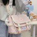 Kawaii Japanese style pink crossbody messenger bag with large capacity and charms. - With Charm / Pink