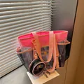 Modern large capacity pink and black mesh tote bag with a matching small pouch - Black
