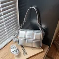 Silver woven crossbody bag for women featuring a metallic finish and extra strap - Silver