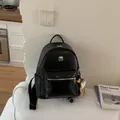 Zaino vintage nero con trama intrecciata e un ciondolo a uccellino per studenti - Con Ciondolo / Nero