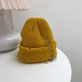 Close-up of yellow streetwear beanie with distressed edges and metal accessories - 55-58cm (Elastic) / Yellow