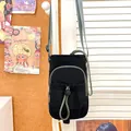 Bolso bandolera de nailon negro y verde para móvil con bolsillo de malla - Negro