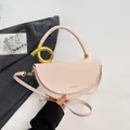 Minimalist beige semi-circle saddle bag with unique gold handle and long strap - Pink
