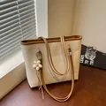 Stylish large capacity cream linen textured tote bag with brown trim and floral charm - With Charm / Khaki