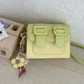 Elegant lime green color-blocked crossbody square bag featuring a cute floral charm - With Pendant / Yellow
