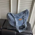 Minimalist blue denim crescent hobo bag for women with leather sport patch detail - L / Blue