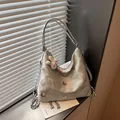 Silver large capacity multi-functional backpack with butterfly design and plush charm detail. - With Charm / Silver