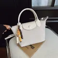 Élégant sac à main crème pour femme avec pendentif en perles, style dumpling - Beige