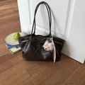 Minimalist large brown leather tote bag with bow detail and plush bear charm decoration - With Charm / Coffee