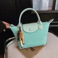 Sac à main élégant vert menthe en daim pour femme avec breloque en perles chic - Vert