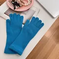 Cozy blue knitted touchscreen gloves for women with functional finger openings - Stretchy / Blue