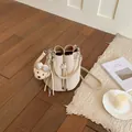 Chic cream textured leather bucket bag for women with a cute plush bear charm decoration - With Charm / Off White
