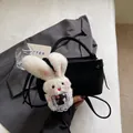 Fashionable black mini crossbody bag featuring a cute white plush bunny charm detail for women - With Charm / Black