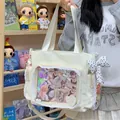 White lace-trimmed ita-bag tote with clear window for displaying character badges and cards - With Charm / Off White