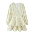 Detailed view of yellow floral V-neck long sleeve ruffled dress with a cinched waist. - S / Dresses / Floral Print Yellow