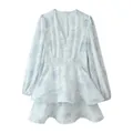 Front view of white floral V-neck long sleeve tiered mini dress with cinched waist - S / Dresses / Light Blue Floral