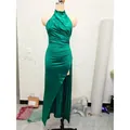 Elegant emerald green halter neck satin maxi dress featuring a high side slit and slim fit - XS / Bottoms / Laced Green