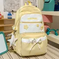 Kawaii light yellow high-capacity student backpack with star prints and bow detail - With Charm / Yellow