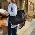 Large capacity black canvas tote bag for women travel and casual daily use - Black