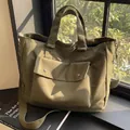 Large olive green canvas tote bag for travel and daily casual use. - Green