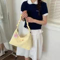 Sweet yellow shoulder bag with pleated handle, strawberry embroidery and cute bunny charm - With Charm / Yellow