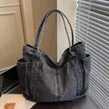 Vintage grey denim tote bag with multiple pockets for daily commuting and travel use - Black