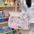 Pink large capacity ita-bag tote with white lace trim and polka dot bow detail - With Charm / Pink