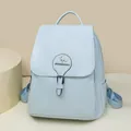 Stylish light blue women's backpack with kangaroo logo detail for casual daily use and travel - Blue