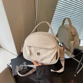 Bolso bandolera de nailon crema versátil para mujer estilo casual - Blanco Roto