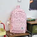 Stylish pink school backpack for girls featuring red star pattern and cute star charm - With Pendant / Pink