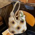 Large capacity beige crochet tote bag featuring sunflower patterns and a cute white rabbit charm - With Charm / Khaki and White