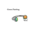Close-up detail of a 4mm iridescent green stainless steel horseshoe piercing ring - 1.2*8mm / Green Iridescent - 4mm Ball