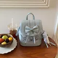 Charming light blue mini backpack featuring a decorative bow and cute puppy patches design - With Pendant / Blue