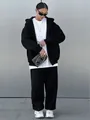 Tuta sportiva da donna nera oversize con felpa con cappuccio e zip e pantaloni, 2 pezzi - Taglia S / Top E Pantaloni / Nero