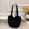Chic black hand-crocheted shoulder bag with minimalist tote design for women - Black