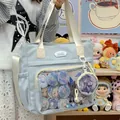 Modern light blue crossbody ita bag tote for women featuring a clear display front window - With Charm / Blue