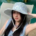 Floral bucket hat with lace brim for women, summer sunshade hat in poolside scene - 56-58cm / Blue