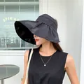 Stylish black vinyl wide-brim sun hat for women with UV protection and butterfly pattern - 55-58cm / Black