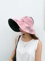 Pink vinyl sun hat with large brim and butterfly pattern for UV protection - 55-58cm / Pink