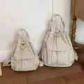 Dos tamaños de mochilas minimalistas con cordón en color crema para uso diario - L / Blanco Roto